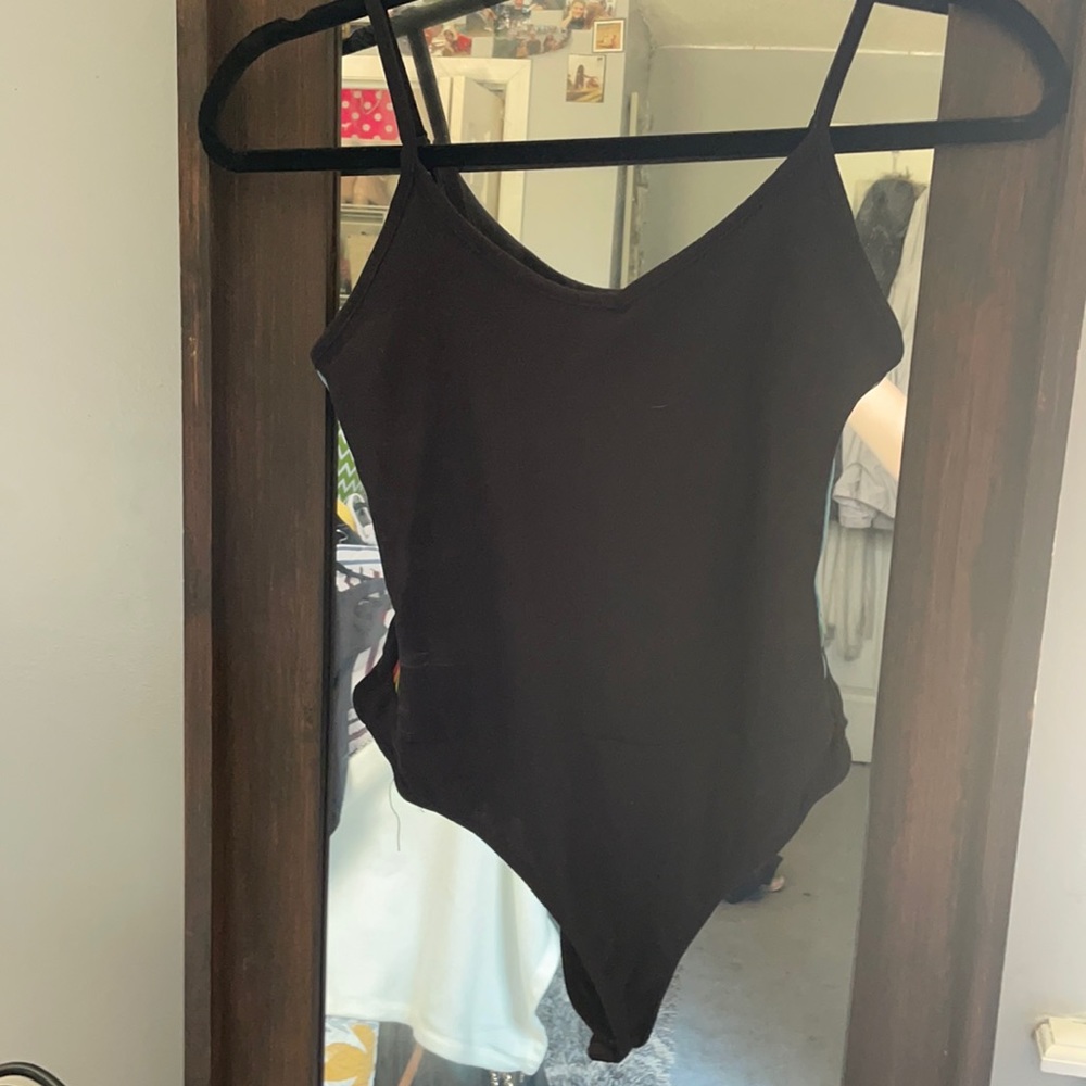Black bodysuit with rainbow stripes